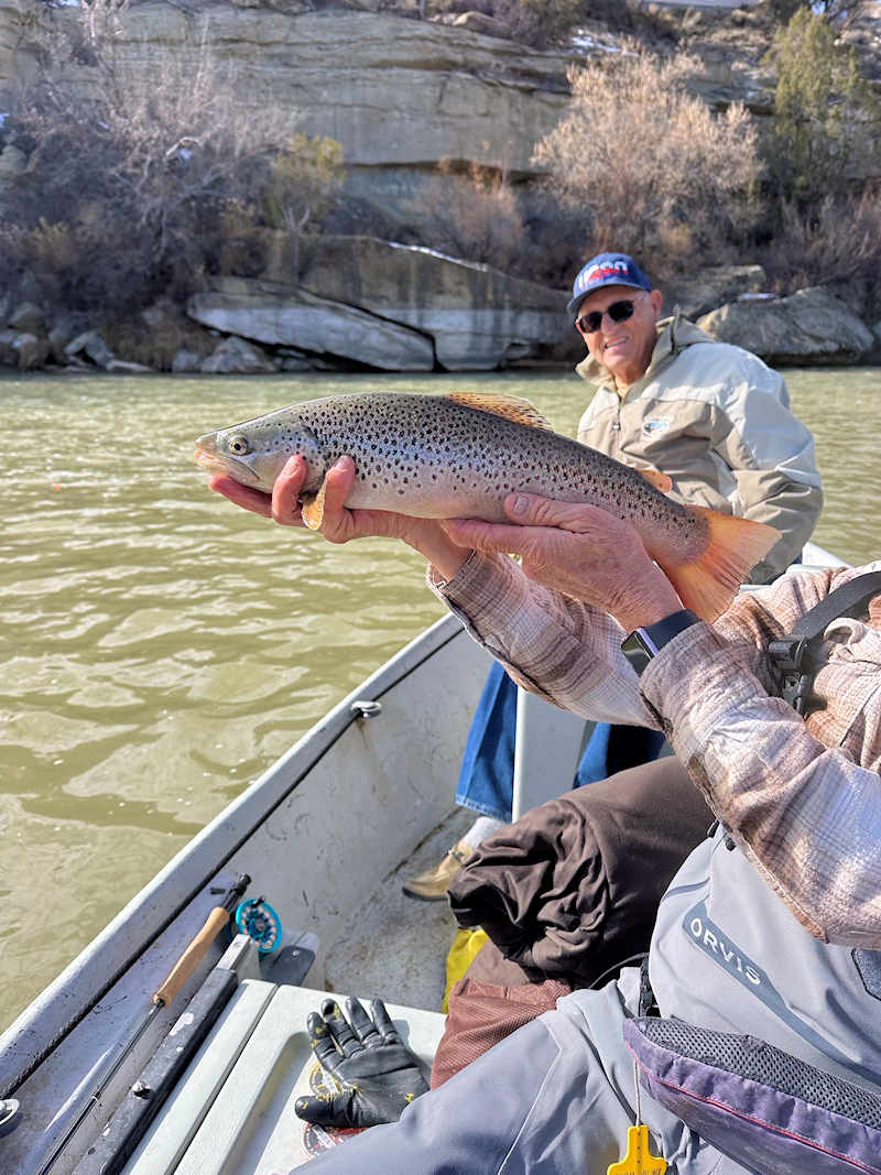 Angler with nice rainbow trout
