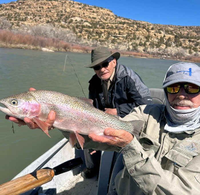 Angler with nice rainbow trout