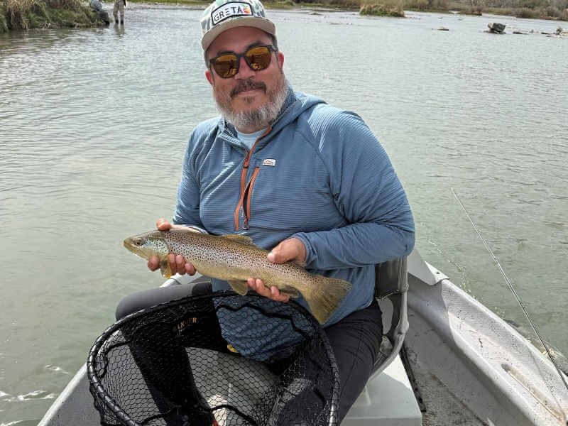 Angler with nice rainbow trout